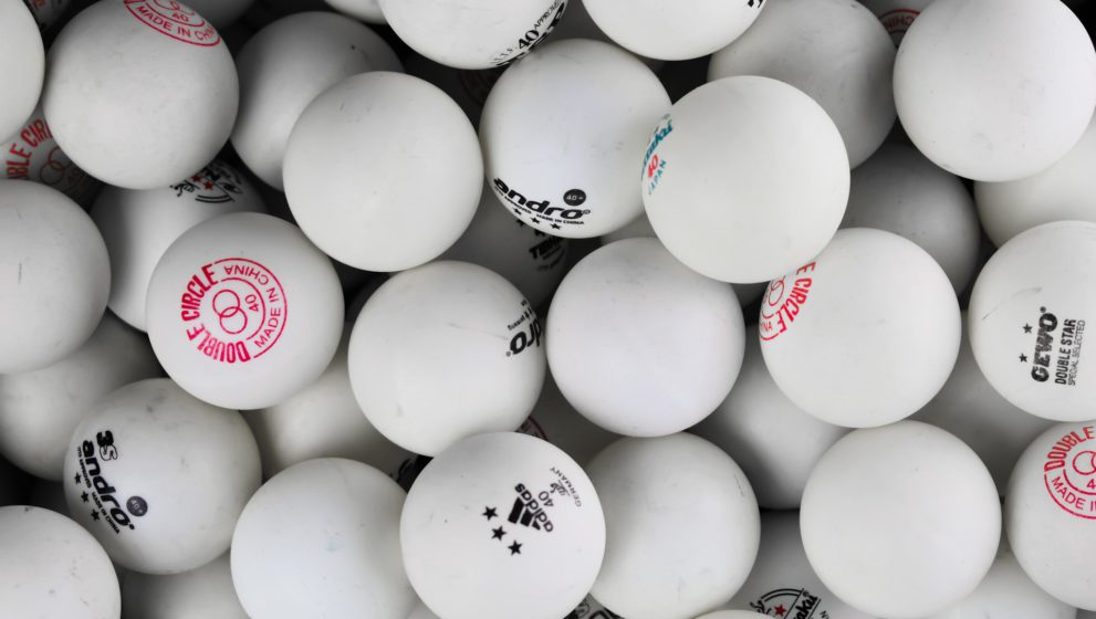 Giant ping pong balls at the speed of light